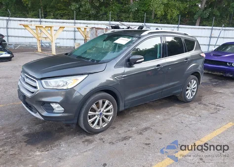 2017 Ford Escape Titanium z USA, uszkodzony, nr VIN 1FMCU9JD8HUA36798